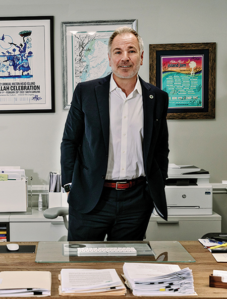 Marc Orlando standing behind his desk at Town Hall